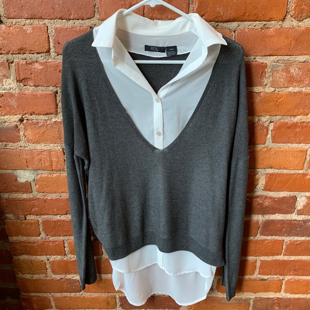 Sheer blouse with sweater on top